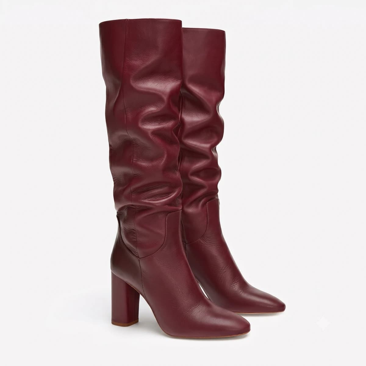 Midnight slouchy pointed-toe tall boots