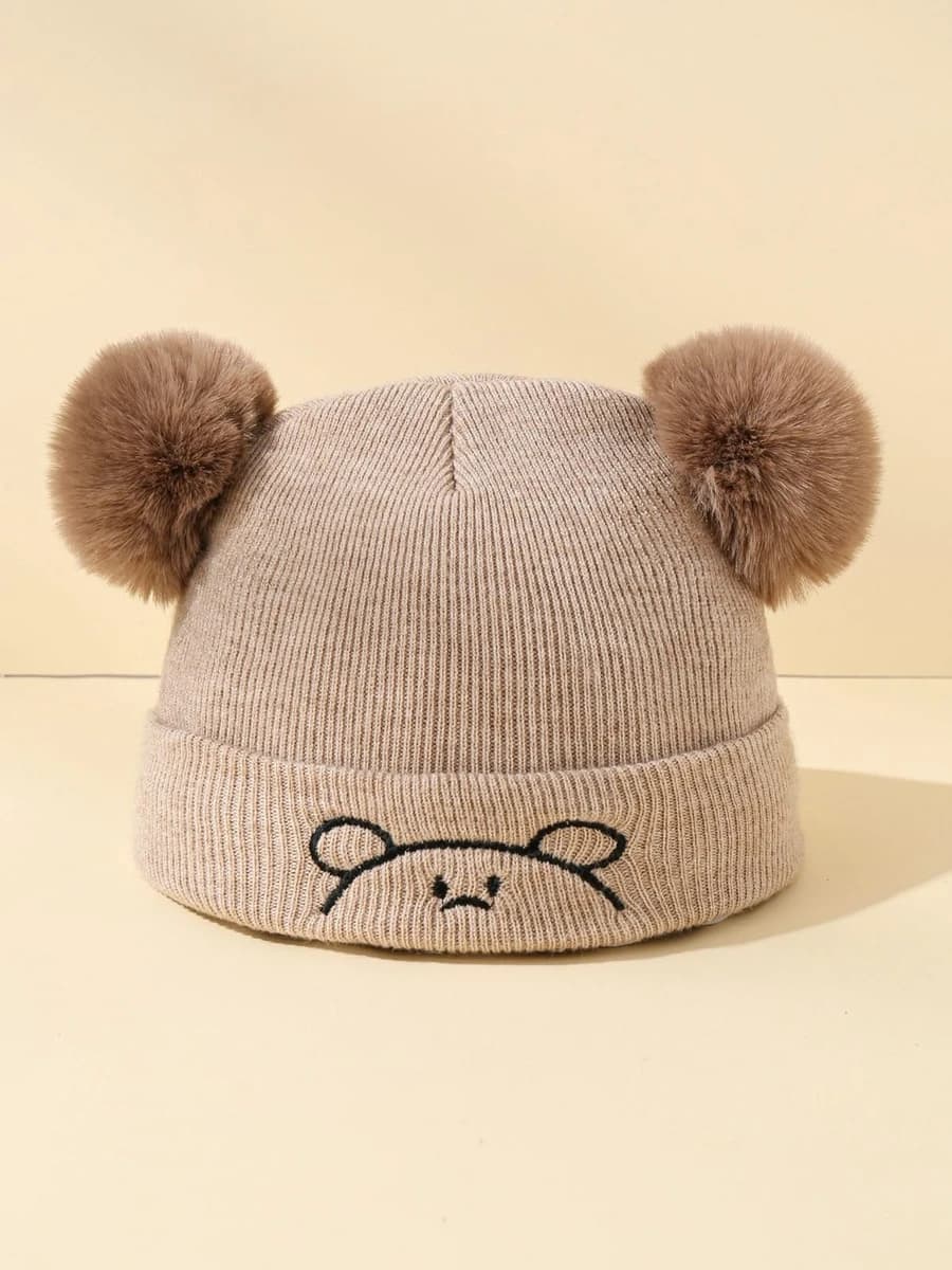 Brown beanie with pom-poms