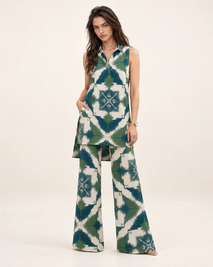 Model in a green and navy tile print sleeveless tunic and matching wide-leg trousers