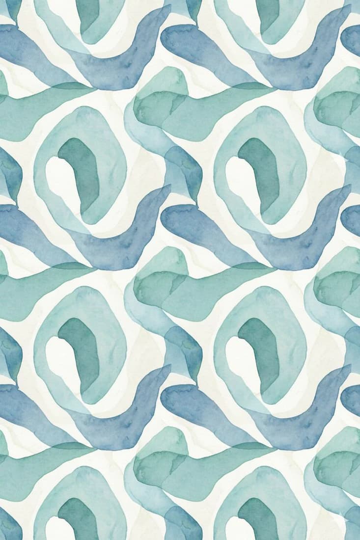Teal and blue watercolour swirl print fabric on an ivory ground
