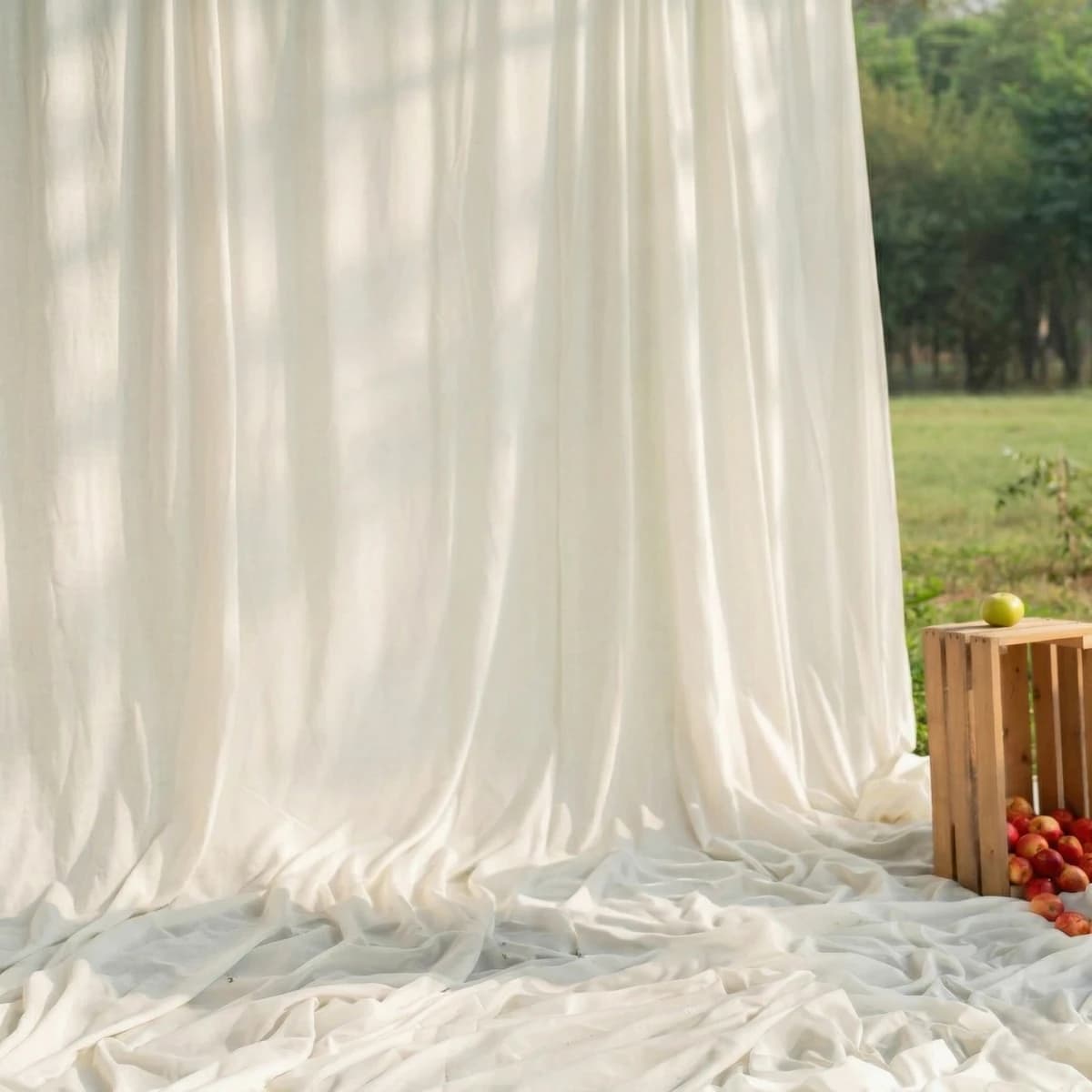 White draped fabric outdoor setup