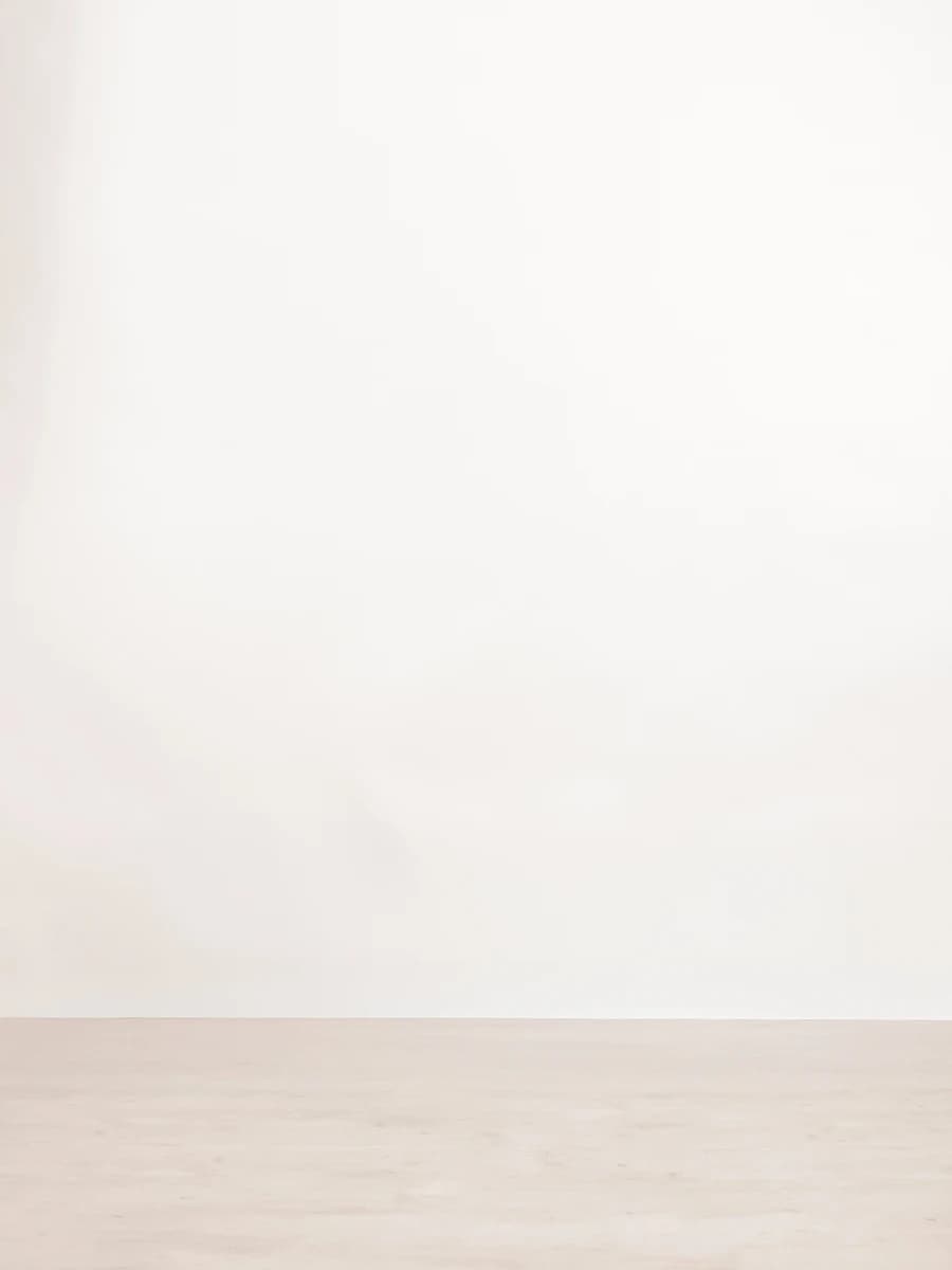 Beige wall with seamless floor